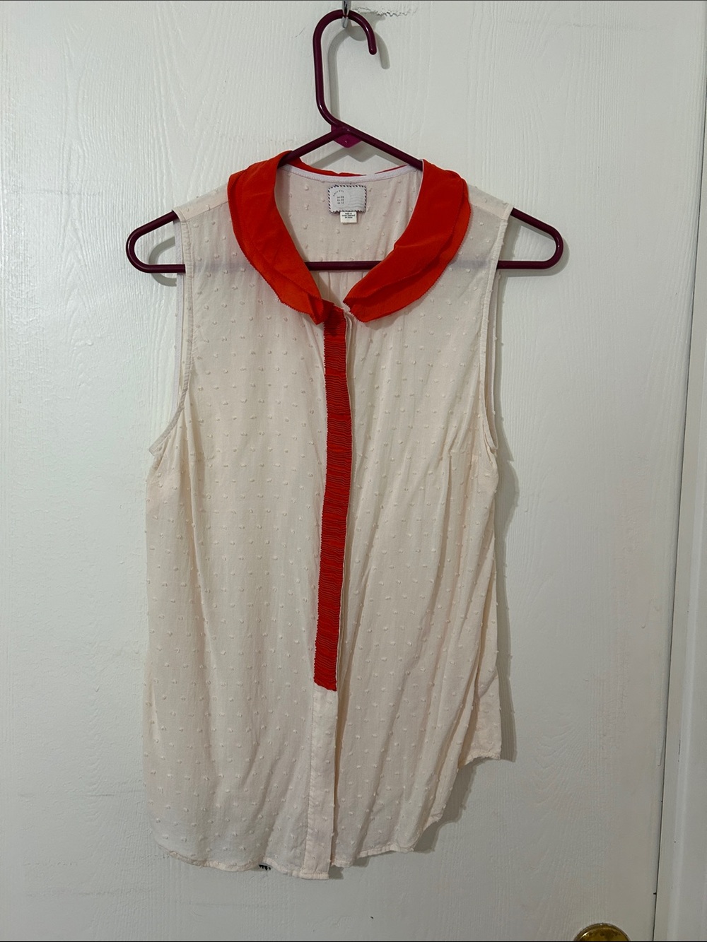 Sleeveless Cream Blouse with Red Contrast Collar